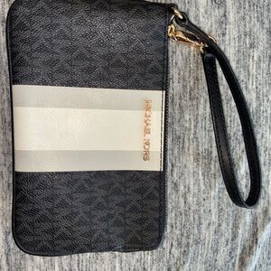 Michael Kors Black with White Center Stripe wristlet